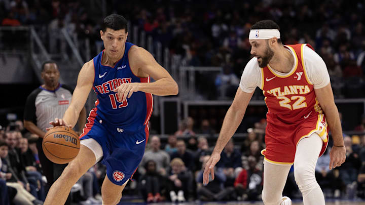 Nov 8, 2024; Detroit, Michigan, USA; Detroit Pistons forward Simone Fontecchio (19) moves the ball up court next to Atlanta Hawks forward Larry Nance Jr. (22) during the second half at Little Caesars Arena. Mandatory Credit: David Reginek-Imagn Images Nov 8, 2024; Detroit, Michigan, USA; Detroit Pistons forward Simone Fontecchio (19) moves the ball up court next to Atlanta Hawks forward Larry Nance Jr. (22) during the second half at Little Caesars Arena. Mandatory Credit: David Reginek-Imagn Images