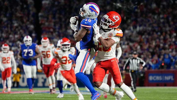 Buffalo Bills wide receiver Elijah Moore (18) is tackled by Kansas City Chiefs defensive back Nohl Williams (20) after catching a pass during the third quarter at Highmark Stadium. 