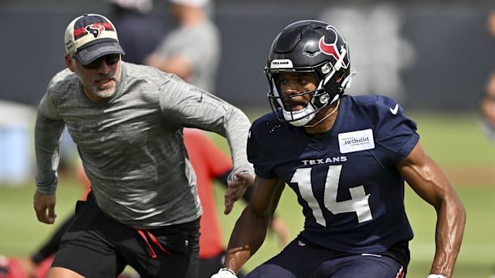 Jun 10, 2025; Houston, TX, USA; Houston Texans wide receiver Jared Wayne (14) participates in a drill during an NFL football minicamp at NRG Stadium. Mandatory Credit: Maria Lysaker-Imagn Images 
