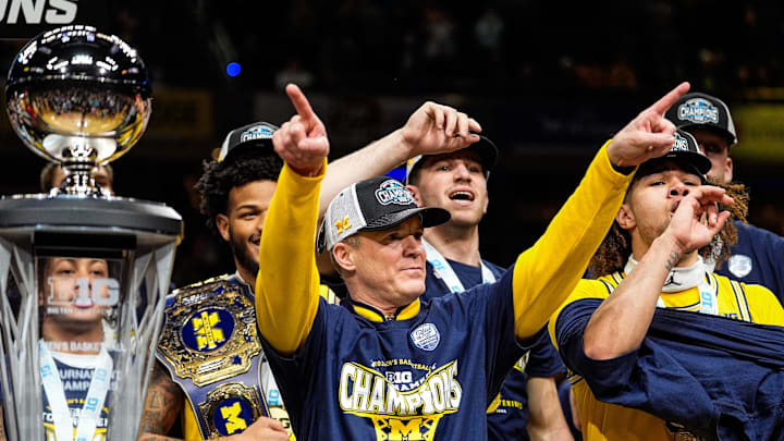 Michigan head coach Dusty May acknowledges the fans as the team celebrate 59-53 win over Wisconsin to win the Big Ten Tournament championship game at Gainbridge Fieldhouse in Indianapolis, Ind. on Sunday, March 16, 2025.