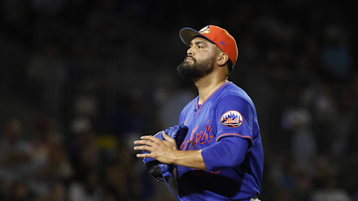 Mar 6, 2026; Jupiter, Florida, USA;  New York Mets pitcher Sean Manaea (59) walks off the field against the Miami Marlins after the first inning at Roger Dean Chevrolet Stadium. Mandatory Credit: Rhona Wise-Imagn Images