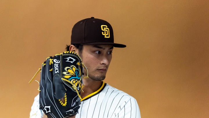 Feb 19, 2025; Peoria, AZ, USA; San Diego Padres pitcher Yu Darvish poses for a portrait during Media Day at Peoria Sports Complex. Mandatory Credit: Mark J. Rebilas-Imagn Images