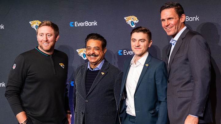 Jacksonville Jaguars Head Coach Liam Coen, left, Owner Shad Khan, second from left, new General Manager James Gladstone, second from right and Executive Vice President of Football Operations Tony Boselli, right, pose for a picture during a press conference Monday morning February 24, 2025 at the Miller Electric Center in Jacksonville, Fla. [Doug Engle/Florida Times-Union]2025