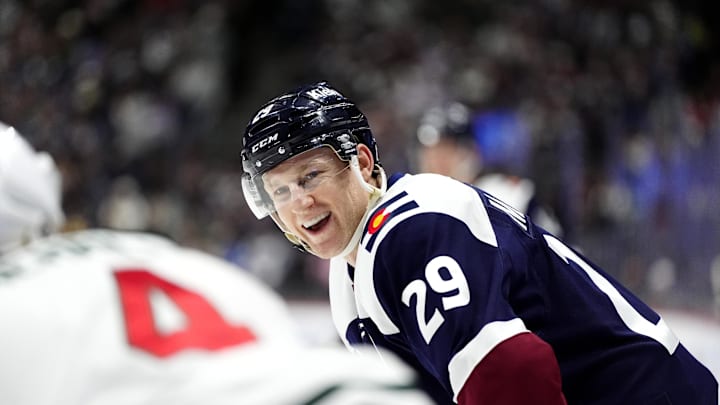 Jan 20, 2025; Denver, Colorado, USA; Colorado Avalanche center Nathan MacKinnon (29) reacts in the second period against the Minnesota Wild at Ball Arena. Mandatory Credit: Ron Chenoy-Imagn Images