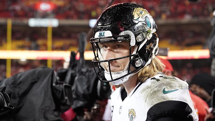 Jan 21, 2023; Kansas City, Missouri, USA; Jacksonville Jaguars quarterback Trevor Lawrence (16) reacts following the loss against the Kansas City Chiefs  in the AFC divisional round game at GEHA Field at Arrowhead Stadium. Mandatory Credit: Denny Medley-Imagn Images