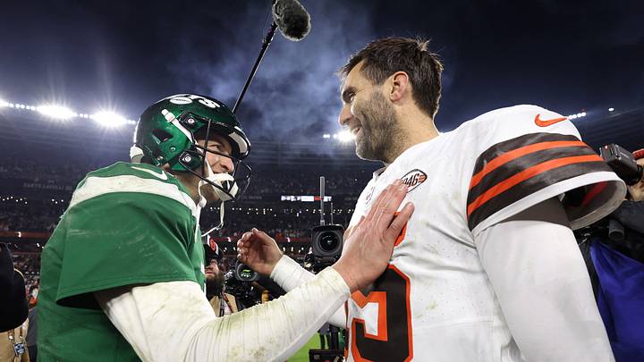 Dec 28, 2023; Cleveland, Ohio, USA; Cleveland Browns quarterback Joe Flacco (15) and New York Jets quarterback Trevor Siemian (left) shake hands after the game  at Cleveland Browns Stadium. Mandatory Credit: Scott Galvin-USA TODAY Sports