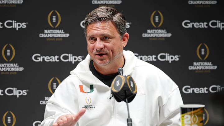 Jan 17, 2026; Miami Gardens, FL, USA; Miami Hurricanes offensive coordinator Shannon Dawson talks to the media during media day for the 2025 College Football Playoff National Championship at Miami Beach Convention Center. Mandatory Credit: Nathan Ray Seebeck-Imagn Images
