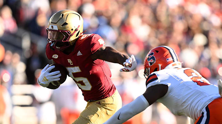 Nov 9, 2024; Chestnut Hill, Massachusetts, USA; Boston College Eagles running back Kye Robichaux (5) runs against the Syracuse Orange during the second half at Alumni Stadium. Mandatory Credit: Brian Fluharty-Imagn Images
