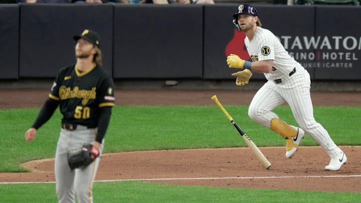 Milwaukee Brewers' Jake Bauers hits a double off Pittsburgh Pirates pitcher Carmen Mlodzinski.
