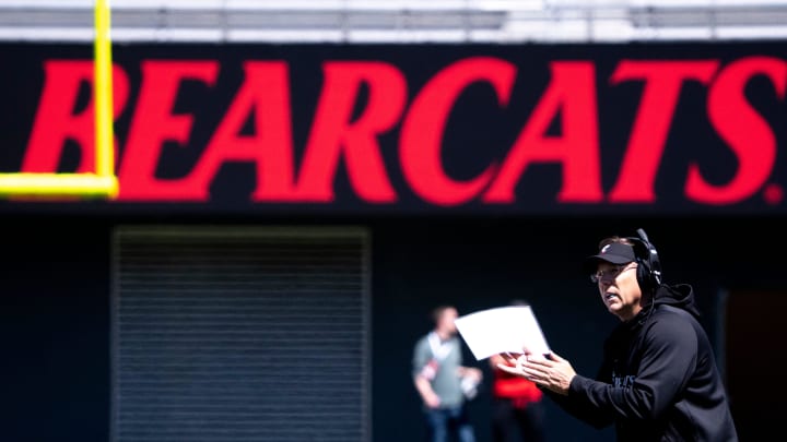 Cincinnati Bearcats head coach Scott Satterfield claps after a good field goal during the University of Cincinnati annual Red and Black Spring football game and practice at Nippert Stadium in Cincinnati on Saturday, April 13, 2024.