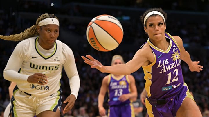 Dallas Wings forward Amy Okonkwo and Los Angeles Sparks guard Rae Burrell.