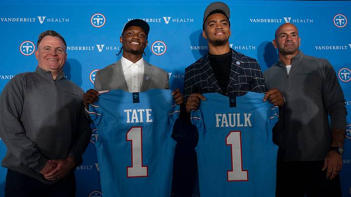Tennessee Titans first round draft picks wide receiver Carnell Tate, second left, and edge Keldric Faulk stand for pictures with Mike Borgonzi, general manager, left, and Coach Robert Saleh at Vanderbilt Health Football Center Friday, April 24, 2026.