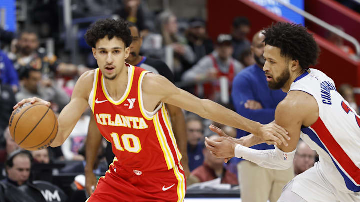 Feb 3, 2025; Detroit, Michigan, USA; Atlanta Hawks forward Zaccharie Risacher (10) dribbles defended by Detroit Pistons guard Cade Cunningham (2) in the second half at Little Caesars Arena. Mandatory Credit: Rick Osentoski-Imagn Images Feb 3, 2025; Detroit, Michigan, USA; Atlanta Hawks forward Zaccharie Risacher (10) dribbles defended by Detroit Pistons guard Cade Cunningham (2) in the second half at Little Caesars Arena. Mandatory Credit: Rick Osentoski-Imagn Images