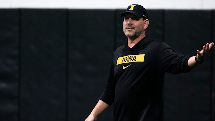 Iowa offensive coordinator Tim Lester talks to the quarterbacks during practice Thursday, April 3, 2025 in Iowa City, Iowa.