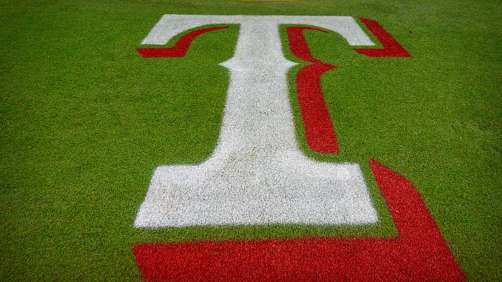 A view of the Texas Rangers logo on the field. Credit: Jerome Miron-USA TODAY Sports