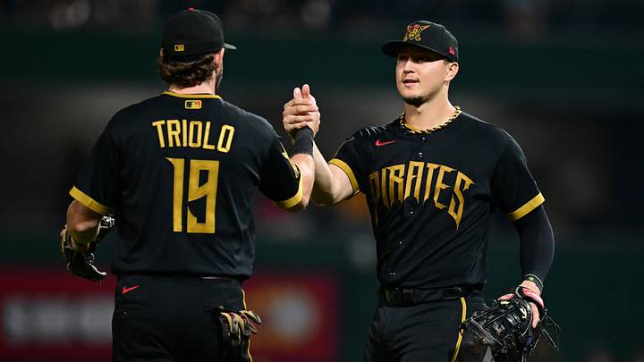Aug 14, 2026; Pittsburgh, Pennsylvania, USA; Pittsburgh Pirates shortstop Jared Triolo (19) is congratulated by first baseman Rafael Flores Jr. (43) after the Pirates defeated the Boston Red Sox at PNC Park. Mandatory Credit: David Dermer-Imagn Images Aug 14, 2026; Pittsburgh, Pennsylvania, USA; Pittsburgh Pirates shortstop Jared Triolo (19) is congratulated by first baseman Rafael Flores Jr. (43) after the Pirates defeated the Boston Red Sox at PNC Park. Mandatory Credit: David Dermer-Imagn Images