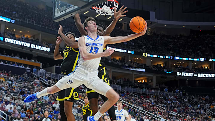 Mar 23, 2024; Pittsburgh, PA, USA; Creighton Bluejays forward Mason Miller (13) shoots the ball