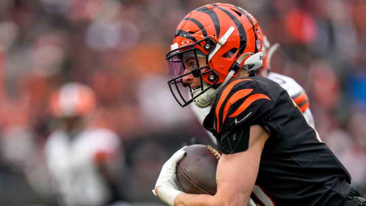 Cincinnati Bengals wide receiver Charlie Jones (15) runs with a catch in the second quarter of the NFL Week 18 game between the Cincinnati Bengals and the Cleveland Browns at Paycor Stadium in downtown Cincinnati on Sunday, Jan. 7, 2024.