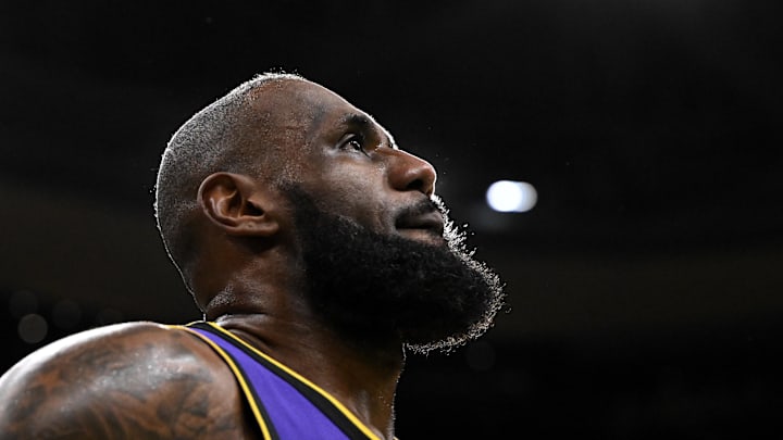 Mar 8, 2025; Boston, Massachusetts, USA; Los Angeles Lakers forward LeBron James (23) looks into the crowd during a timeout in the fourth quarter of a game against the Boston Celtics at the TD Garden. Mandatory Credit: Brian Fluharty-Imagn Images