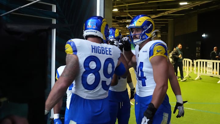 Oct 19, 2025; London, United Kingdom; Los Angeles Rams tight end Tyler Higbee (89), tight end Colby Parkinson (84), running back Ronnie Rivers (20), tight end Davis Allen (87) and tight end Terrance Ferguson (18) huddle and during a NFL International Series game against the Jacksonville Jaguars at Wembley Stadium. Mandatory Credit: Kirby Lee-Imagn Images