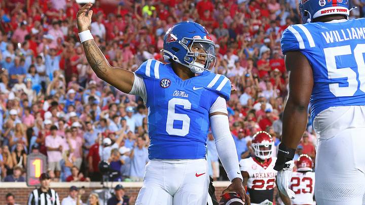 Ole Miss Rebels quarterback Trinidad Chambliss (6) reacts after a touchdown run during the second quarter against the Arkansas Razorback at Vaught-Hemingway Stadium. Ole Miss Rebels quarterback Trinidad Chambliss (6) reacts after a touchdown run during the second quarter against the Arkansas Razorback at Vaught-Hemingway Stadium.