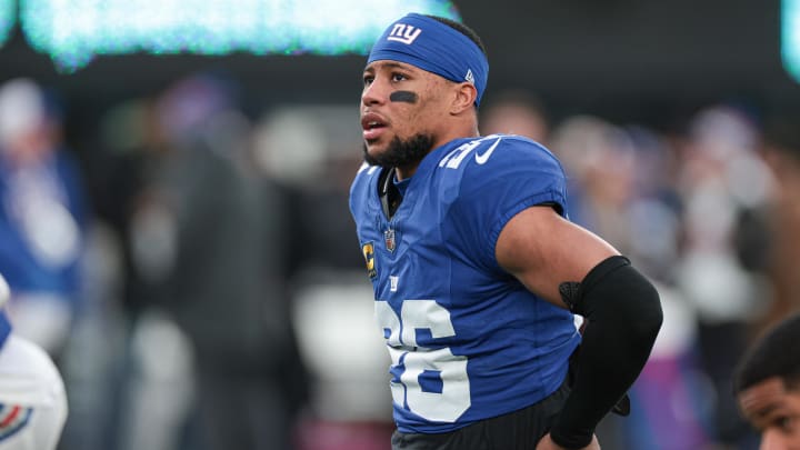 Jan 7, 2024; East Rutherford, New Jersey, USA; New York Giants running back Saquon Barkley (26) looks up before the game against the Philadelphia Eagles at MetLife Stadium. Jan 7, 2024; East Rutherford, New Jersey, USA; New York Giants running back Saquon Barkley (26) looks up before the game against the Philadelphia Eagles at MetLife Stadium.