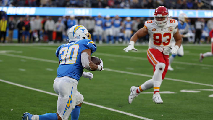 Jan 7, 2024; Inglewood, California, USA;  Los Angeles Chargers running back Austin Ekeler (30) runs