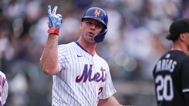 May 27, 2025; New York City, New York, USA; New York Mets first baseman Pete Alonso (20) reacts after hitting a two run home run during the first inning against the Chicago White Sox at Citi Field. Mandatory Credit: Vincent Carchietta-Imagn Images