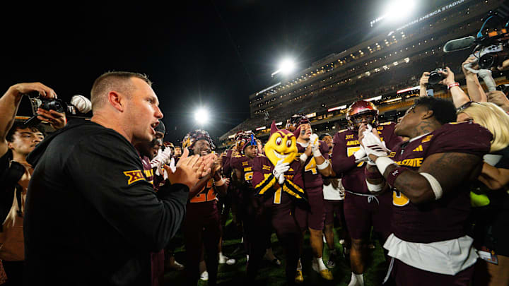 Sep 13, 2025; Tempe, Arizona, USA; Arizona State Sun Devils running back Raleek Brown (3)  and Arizona State Sun Devils head coach Kenny Dillingham lead the fight song after the game between Arizona State Sun Devils and Texas State Bobcats. Mandatory Credit: Arianna Grainey-Imagn Images