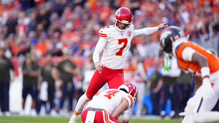 Nov 16, 2025; Denver, Colorado, USA; Kansas City Chiefs kicker Harrison Butker (7) prepares to kick a field goal in the second quarter against the Denver Broncos at Empower Field at Mile High. Mandatory Credit: Ron Chenoy-Imagn Images