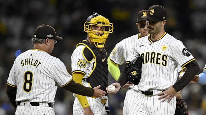 Oct 9, 2024; San Diego, California, USA; San Diego Padres manager Mike Shildt (8) takes out pitcher Dylan Cease (84) in the second inning against the Los Angeles Dodgers during game four of the NLDS for the 2024 MLB Playoffs at Petco Park. Mandatory Credit: Denis Poroy-Imagn Images Oct 9, 2024; San Diego, California, USA; San Diego Padres manager Mike Shildt (8) takes out pitcher Dylan Cease (84) in the second inning against the Los Angeles Dodgers during game four of the NLDS for the 2024 MLB Playoffs at Petco Park. Mandatory Credit: Denis Poroy-Imagn Images