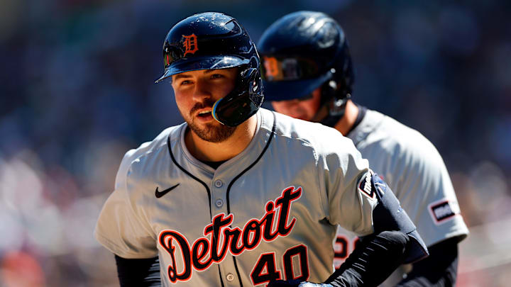 Detroit Tigers' new addition Buddy Kennedy heads back to the dugout after hitting a home run in a game vs Minnesota Twins.