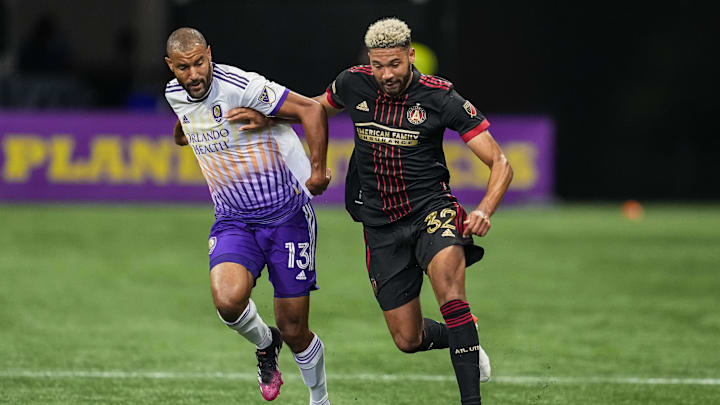 Jul 17, 2022; Atlanta, Georgia, USA; Atlanta United defender George Campbell (32) fights for the