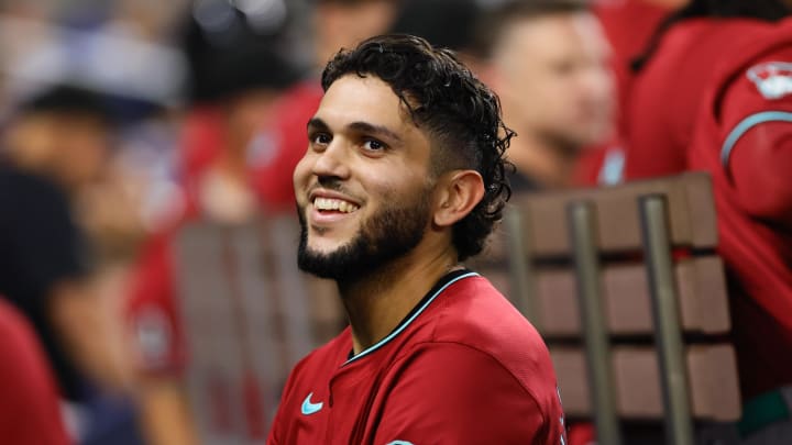 Aug 19, 2024; Miami, Florida, USA; Arizona Diamondbacks catcher Adrian Del Castillo (25) looks on from the dugout after hitting a grand slam against the Miami Marlins during the third inning at loanDepot Park. Mandatory Credit: Sam Navarro-USA TODAY Sports Aug 19, 2024; Miami, Florida, USA; Arizona Diamondbacks catcher Adrian Del Castillo (25) looks on from the dugout after hitting a grand slam against the Miami Marlins during the third inning at loanDepot Park. Mandatory Credit: Sam Navarro-USA TODAY Sports