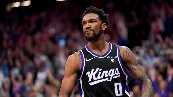 Mar 7, 2024; Sacramento, California, USA; Sacramento Kings guard Malik Monk (0) reacts after the Kings defeated the San Antonio Spurs at the Golden 1 Center. Mar 7, 2024; Sacramento, California, USA; Sacramento Kings guard Malik Monk (0) reacts after the Kings defeated the San Antonio Spurs at the Golden 1 Center.