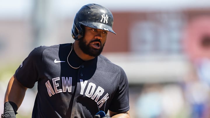 New York Yankees outfielder Jasson Dominguez rounds the bases after hitting a home run against the Chicago Cubs during spring training at Sloan Park.