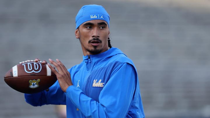 Sep 12, 2025; Pasadena, California, USA;  UCLA Bruins quarterback Nico Iamaleava (9) warms up before the game against the New Mexico Lobos at Rose Bowl. Mandatory Credit: Kiyoshi Mio-Imagn Images