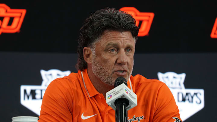 Jul 9, 2025; Frisco, TX, USA; Oklahoma State head coach Mike Gundy speaks with the media during 2025 Big 12 Football Media Days at The Star. Mandatory Credit: Raymond Carlin III-Imagn Images Jul 9, 2025; Frisco, TX, USA; Oklahoma State head coach Mike Gundy speaks with the media during 2025 Big 12 Football Media Days at The Star. Mandatory Credit: Raymond Carlin III-Imagn Images