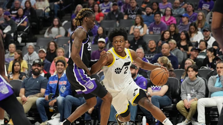 Mar 31, 2024; Sacramento, California, USA; Utah Jazz guard Collin Sexton (2) dribbles against Sacramento Kings guard Keon Ellis (left) during the fourth quarter at Golden 1 Center. Mandatory Credit: Darren Yamashita-Imagn Images Mar 31, 2024; Sacramento, California, USA; Utah Jazz guard Collin Sexton (2) dribbles against Sacramento Kings guard Keon Ellis (left) during the fourth quarter at Golden 1 Center. Mandatory Credit: Darren Yamashita-Imagn Images
