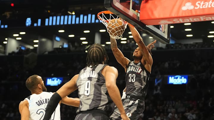 Apr 3, 2025; Brooklyn, New York, USA; Brooklyn Nets center Nic Claxton (33) dunks the ball against the Minnesota Timberwolves during the first half at Barclays Center. Mandatory Credit: Gregory Fisher-Imagn Images