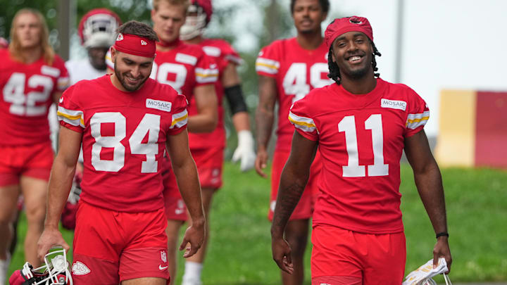 Jul 22, 2025; St. Joseph, MO, USA; Kansas City Chiefs wide receivers Mac Dalena (84) and Jalen Royals (11) walk down the hill to the practice fields during training camp at Missouri Western State University. Mandatory Credit: Denny Medley-Imagn Images