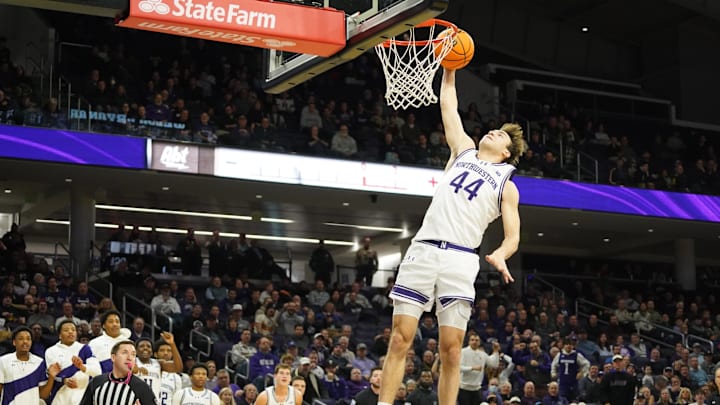 Jan 29, 2026; Evanston, Illinois, USA; Northwestern Wildcats guard Angelo Ciaravino (44) goes up for a dunk against the Penn State Nittany Lions during the second half at Welsh-Ryan Arena. 