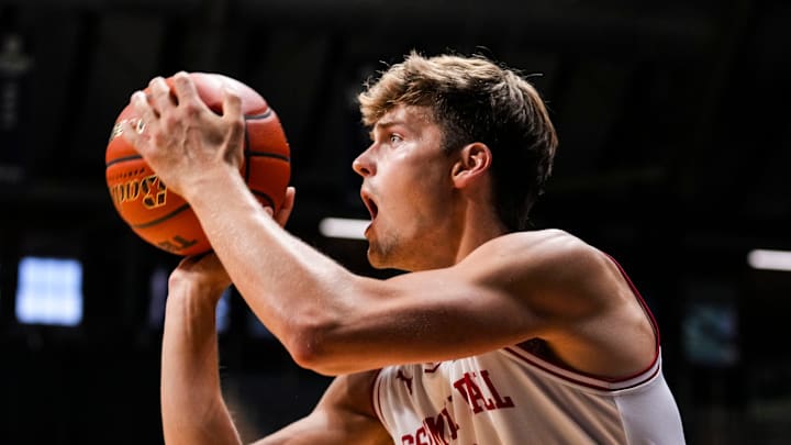 Assembly Ball Miller Kopp (12) shoots a 3-pointer Tuesday, July 23, 2024, during the final matchup of The Basketball Tournament at Hinkle Fieldhouse in Indianapolis. Eberlein Drive defeated Assembly Hall, 82-79.