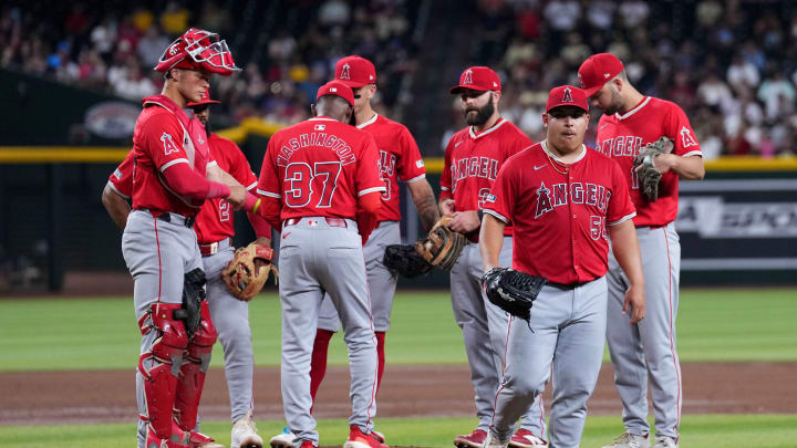Jun 11, 2024; Phoenix, Arizona, USA; Los Angeles Angels manager Ron Washington (37) removes Los Angeles Angels pitcher José Suarez (54) from the game against the Arizona Diamondbacks during the third inning at Chase Field. Mandatory Credit: Joe Camporeale-USA TODAY Sports