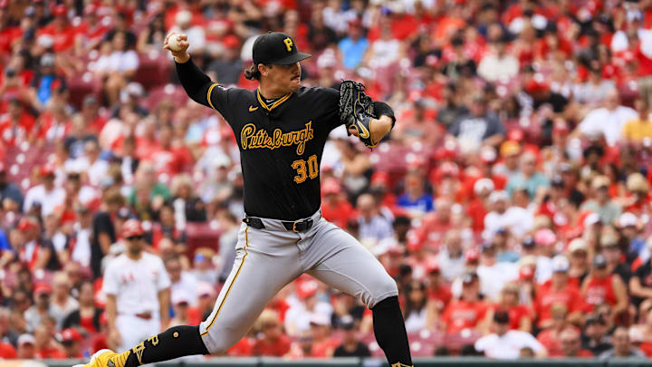 Sep 22, 2024; Cincinnati, Ohio, USA; Pittsburgh Pirates starting pitcher Paul Skenes (30) pitches against the Cincinnati Reds in the first inning at Great American Ball Park. Mandatory Credit: Katie Stratman-Imagn Images Sep 22, 2024; Cincinnati, Ohio, USA; Pittsburgh Pirates starting pitcher Paul Skenes (30) pitches against the Cincinnati Reds in the first inning at Great American Ball Park. Mandatory Credit: Katie Stratman-Imagn Images