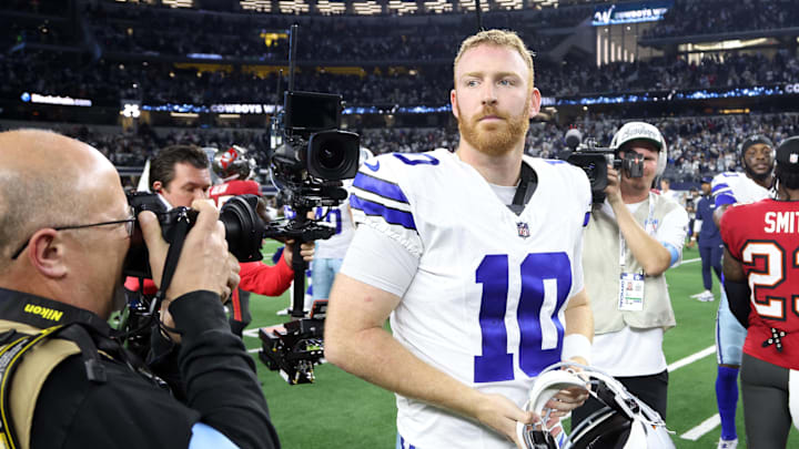 Dallas Cowboys quarterback Cooper Rush (10) walks off the field after the game against the Tampa Bay Buccaneers at AT&T Stadium. Dallas Cowboys quarterback Cooper Rush (10) walks off the field after the game against the Tampa Bay Buccaneers at AT&T Stadium.