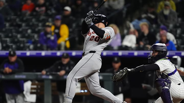 May 7, 2025; Denver, Colorado, USA; Detroit Tigers first base Spencer Torkelson (20) RBI doubles in the tenth inning against the Colorado Rockies at Coors Field. May 7, 2025; Denver, Colorado, USA; Detroit Tigers first base Spencer Torkelson (20) RBI doubles in the tenth inning against the Colorado Rockies at Coors Field.
