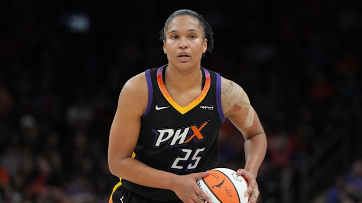Jul 23, 2025; Phoenix, Arizona, USA; Phoenix Mercury forward Alyssa Thomas (25) looks to pass against the Atlanta Dream in the second half at Footprint Center. Mandatory Credit: Rick Scuteri-Imagn Images