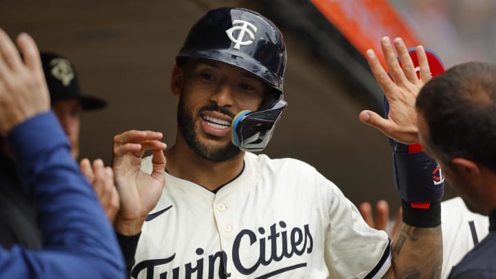 Jun 12, 2024; Minneapolis, Minnesota, USA; Minnesota Twins shortstop Carlos Correa (4) celebrates run against the Colorado Rockies in the sixth inning at Target Field. Mandatory Credit: Bruce Kluckhohn-USA TODAY Sports
