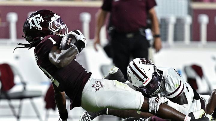 Sep 5, 2026; College Station, Texas, USA; Texas A&M Aggies wide receiver Mario Craver (1) is tackle by Missouri State Bears cornerback Joel Kpassou (8) during the second half at Kyle Field. Mandatory Credit: Maria Lysaker-Imagn Images Sep 5, 2026; College Station, Texas, USA; Texas A&M Aggies wide receiver Mario Craver (1) is tackle by Missouri State Bears cornerback Joel Kpassou (8) during the second half at Kyle Field. Mandatory Credit: Maria Lysaker-Imagn Images
